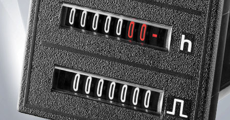 Double function counter: Acquisition of pulses and times or of kWh and times. Electromechanical counter.